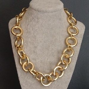 Gold tone interlocking thick circle necklace